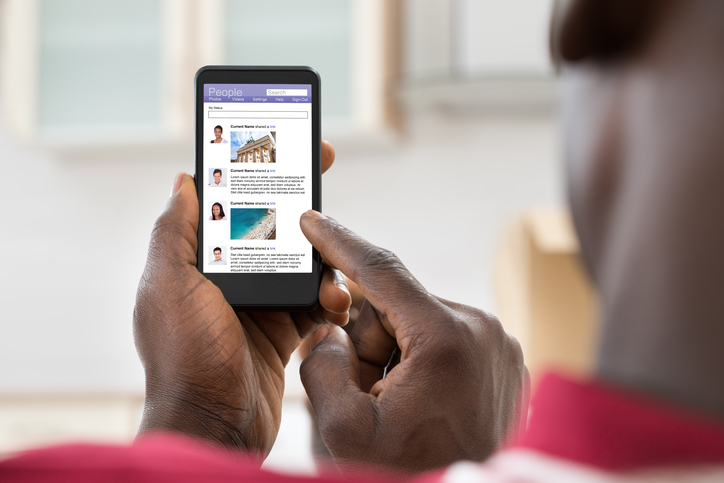 Man Surfing On Social Networking Site