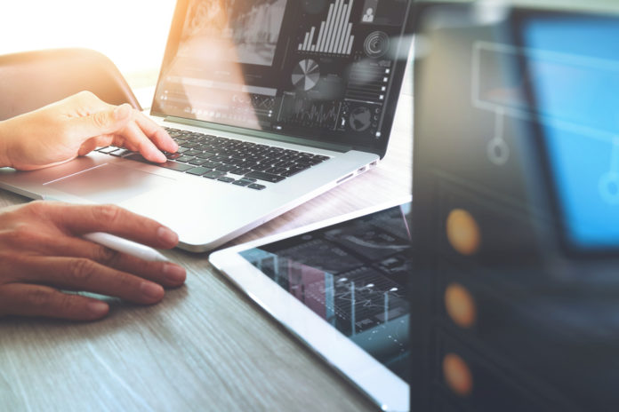Website,Designer,Working,With,Digital,Tablet,And,Computer,Laptop,And SEO