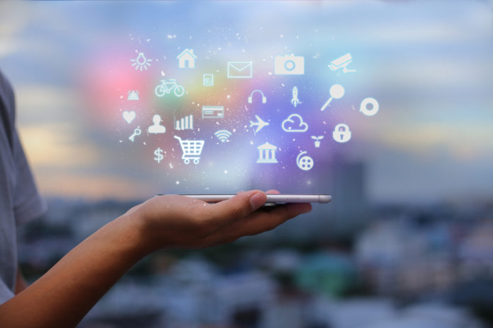 Mobile,Application,Concept.man,Using,Touch,Screen,Smart,Phone,On,Blurred mobile