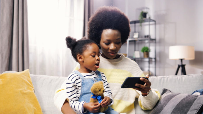 Portrait,Of,Happy,African,American,Family,Pretty,Mother,And,Small marketing to parents