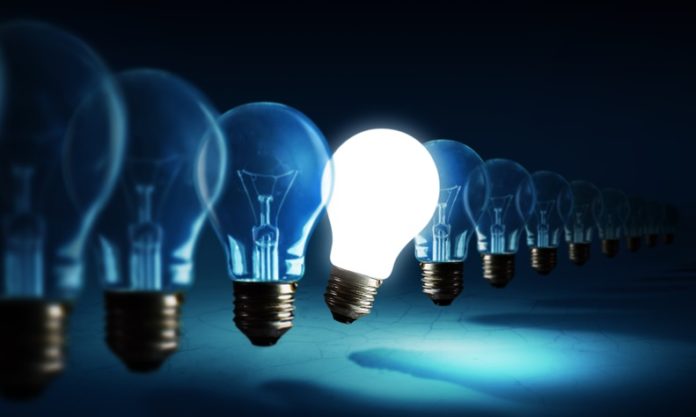 Lightbulbs,On,Blue,Background,,Idea,Concept innovation