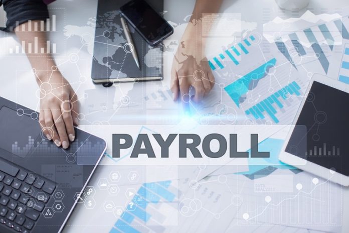 Woman,Working,With,Documents,,Tablet,Pc,And,Notebook.,Payroll,Concept. payroll